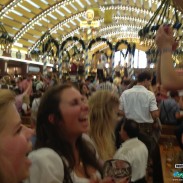 Dancing on the tabletops inside Lowenbrau tent