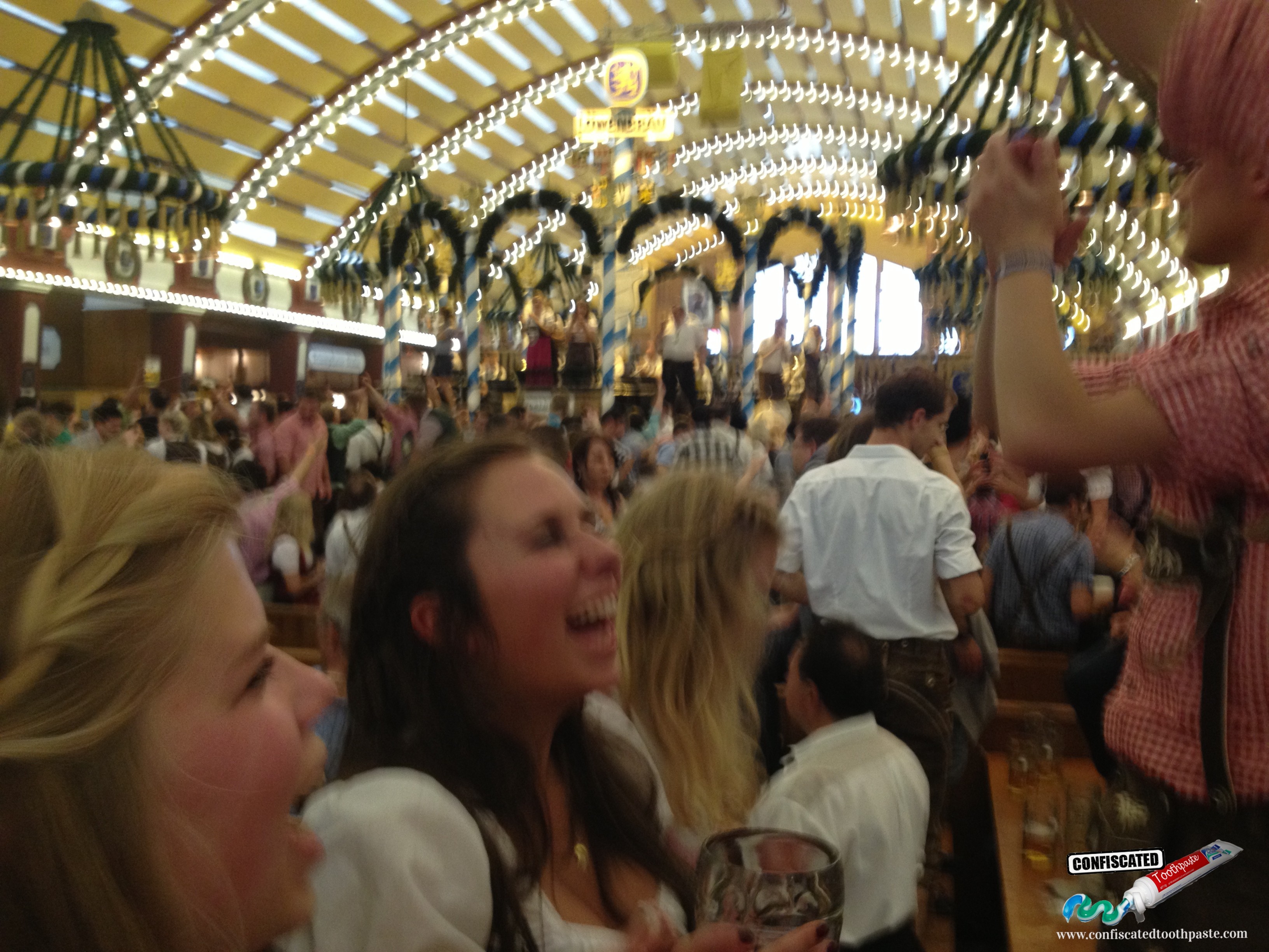 Dancing on the tabletops inside Lowenbrau tent