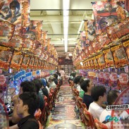 Pachinko parlour with rows of machines with colourful lights and gaudy music, Japan