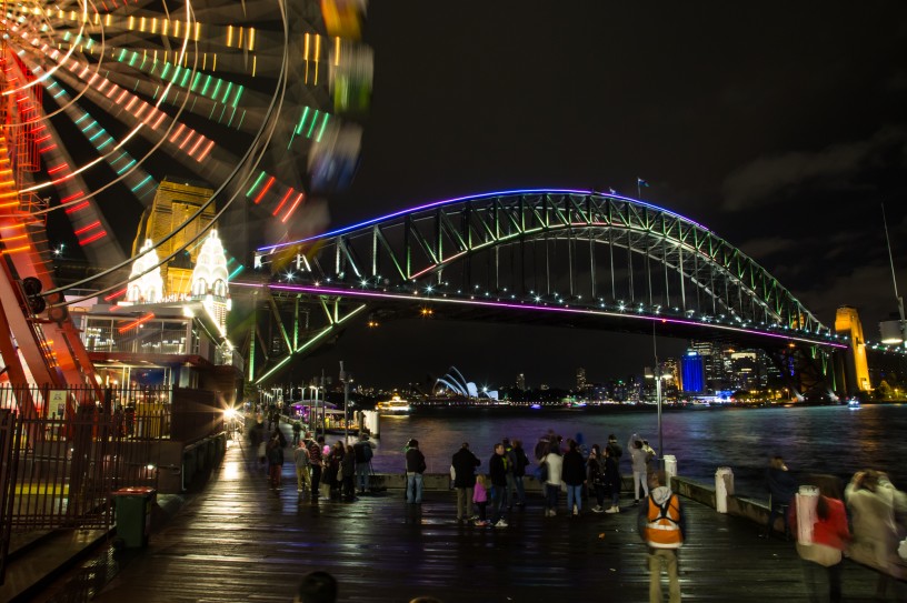 Sydney Harbour Bridge in Blue, Pink and Green with Luna Park Ferris Wheel, Vivid Festival 2014