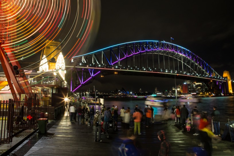 Sydney Harbour Bridge in Aqua and Pink with Blurred Luna Park Ferris Wheel, Vivid Festival 2014