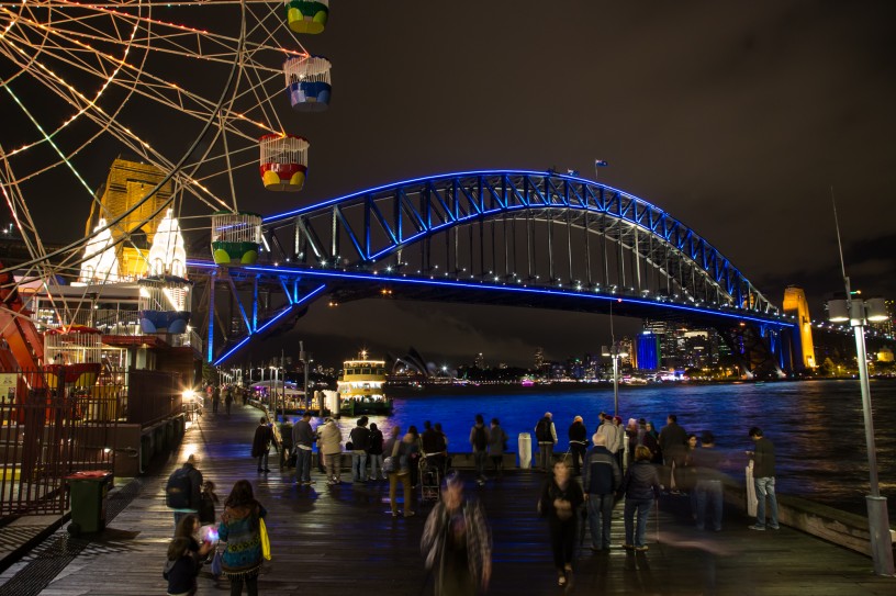 Sydney Harbour Bridge in Blue with Ferry and Luna Park Ferris Wheel, Vivid Festival 2014