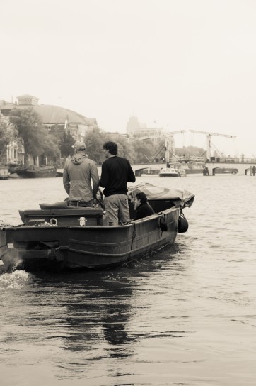 Men in a dinghy on the Amstel River